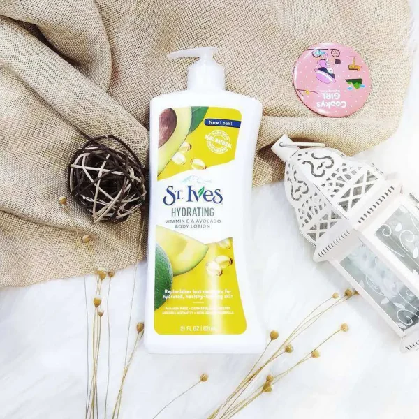 St. Ives Hydrating Vitamin E & Avocado Body Lotion enriched with Vitamin E and avocado extract.