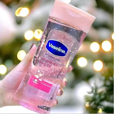 Vaseline Intensive Care Vitamin B3 Body Oil improves skin tone and provides lasting hydration.