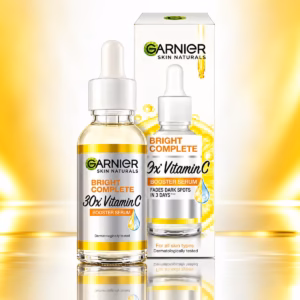 Authentic Garnier Vitamin C Serum bottle displaying bright yellow packaging for dark spot reduction